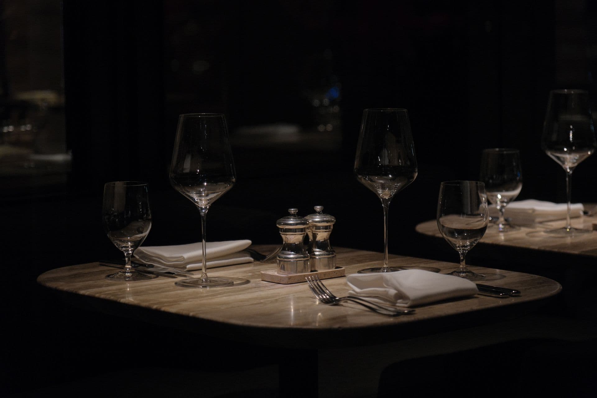 An intimate table set for dinner at El Fogón